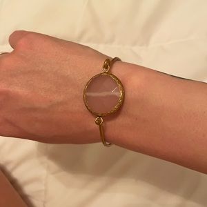 Gold bracelet and pink stone!